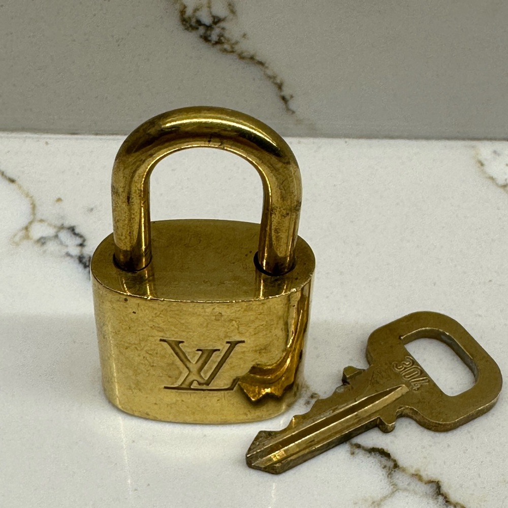 Louis Vuitton gold Padlock Keychain #304 used in excellent condition. - Picture 3 of 5